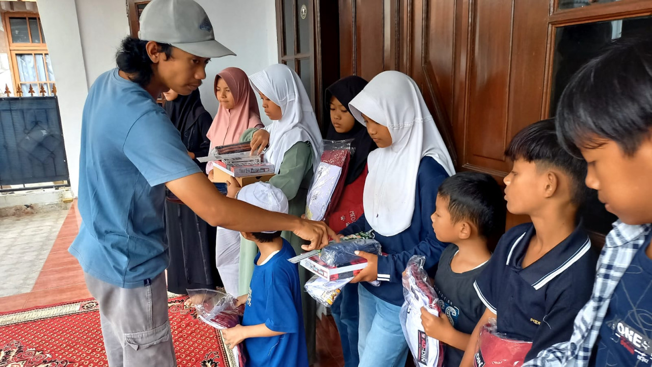 Senyum Anak Yatim Warnai Aksi Sosial Squad Hijrah Parkir Manaku di Tasikmalaya