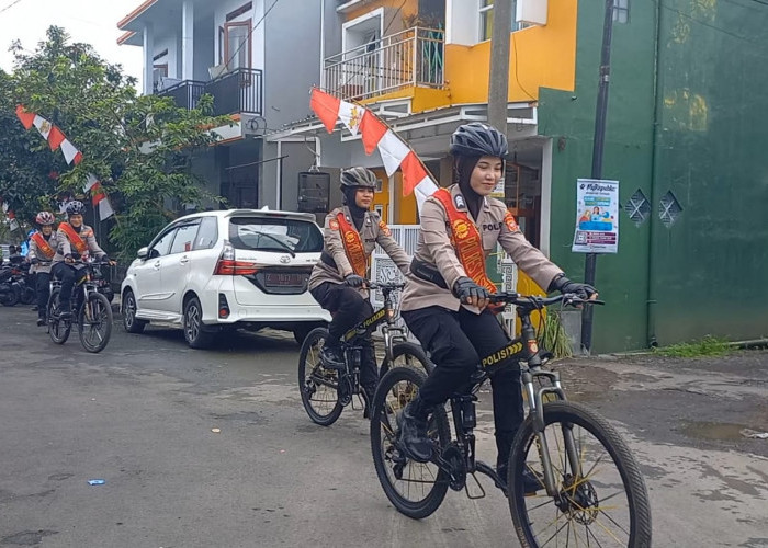 Polwan Polres Tasikmalaya Kota Patroli Sepeda saat Hari H Pencoblosan Pemilu 2024 